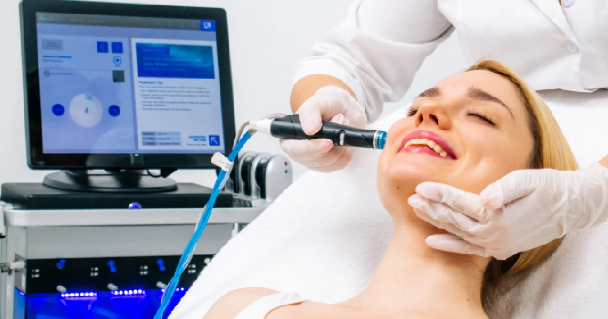 A woman receiving a HydraFacial treatment in Ankeny, IA